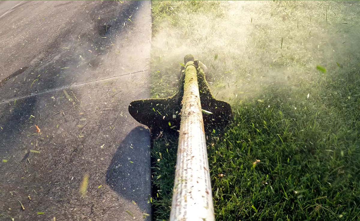 Cleaning yard with all grass clippings and debris blown off